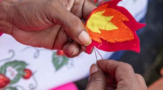 Hände die sticken | © AAI