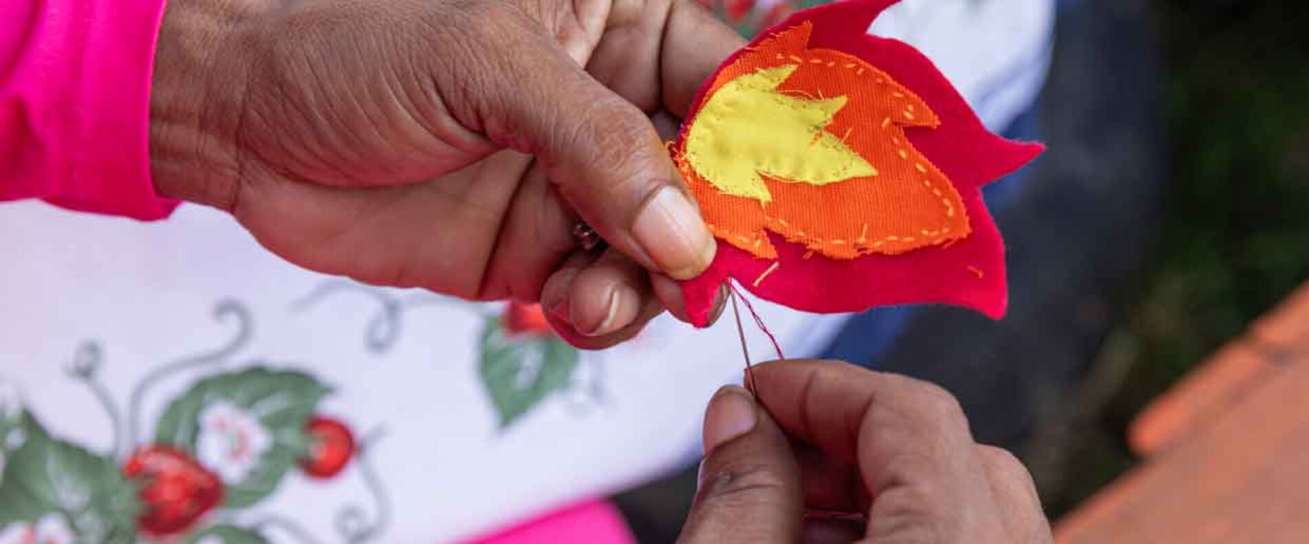 Hände die sticken | © AAI