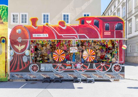 Glücksrad Lokomotive am Salzburger Rupertikirtag | © Christoph Haid